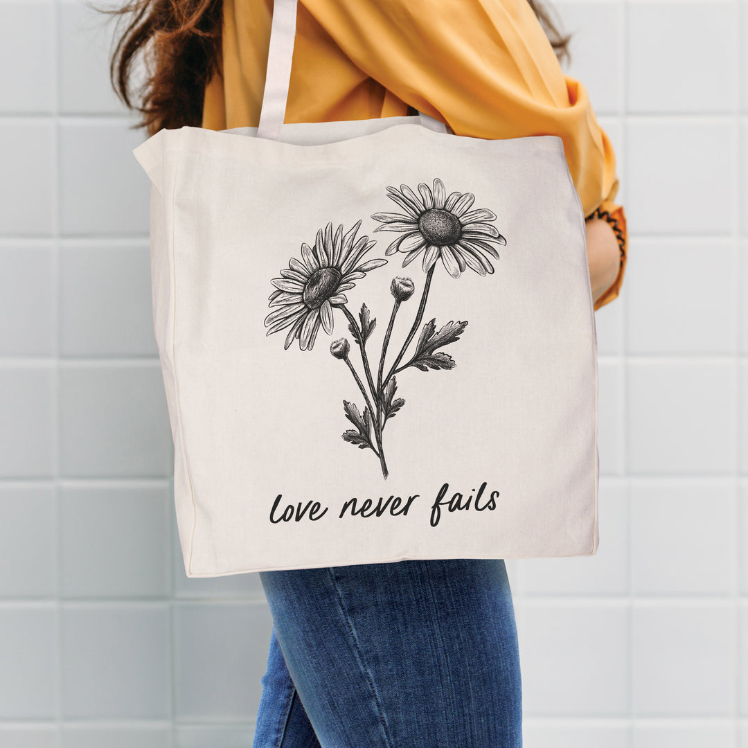 Love Never Fails Tote Bag